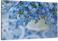 Obraz delikatne niebieskie kwiaty dekoracyjny na płótnie canvas 