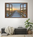 Naklejka do salonu WIDOK PRZEZ BRĄZOWE OKNO zachód słońca nad morzem pomost 